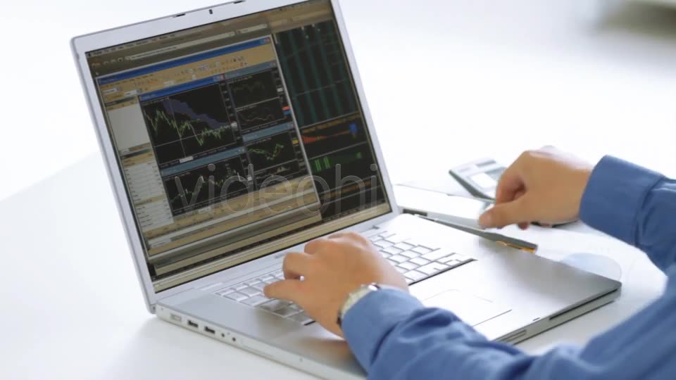 Businessman Checking Stock Market At His Laptop  Videohive 4356192 Stock Footage Image 2