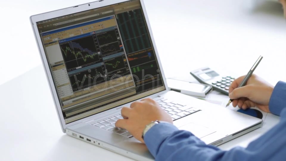 Businessman Checking Stock Market At His Laptop  Videohive 4356192 Stock Footage Image 3