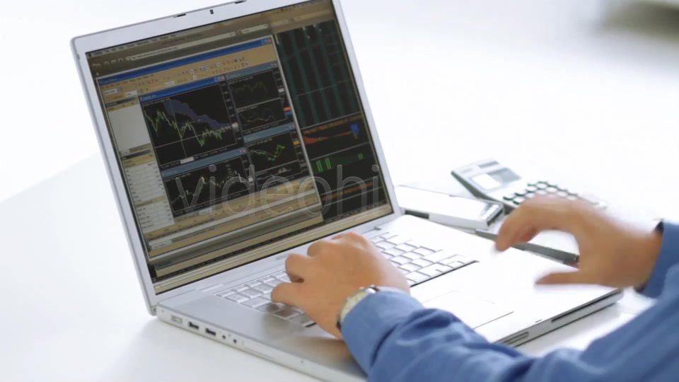 Businessman Checking Stock Market At His Laptop  Videohive 4356192 Stock Footage Image 4