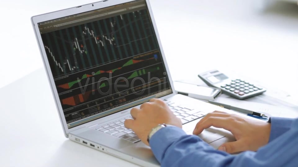 Businessman Checking Stock Market At His Laptop  Videohive 4356192 Stock Footage Image 5