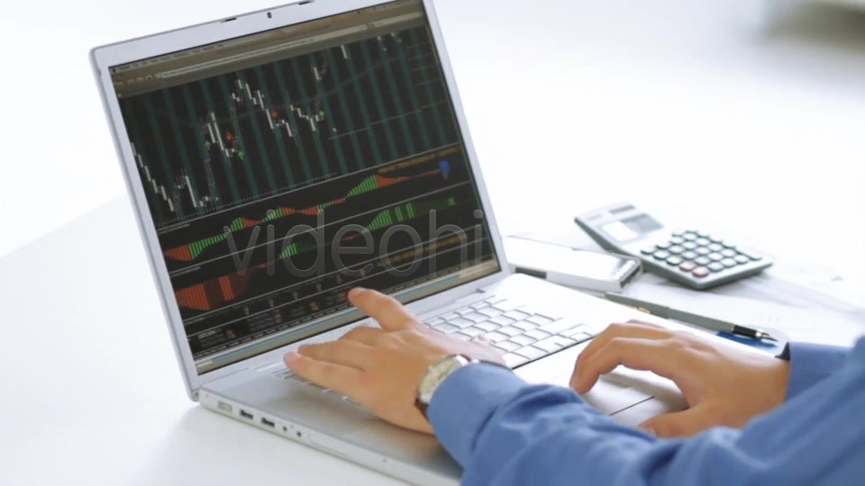 Businessman Checking Stock Market At His Laptop  Videohive 4356192 Stock Footage Image 6