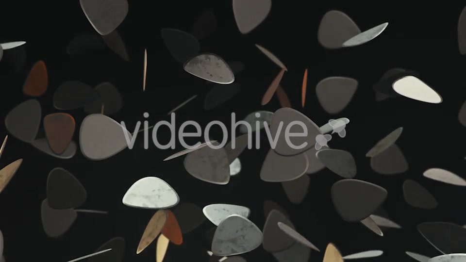 Floating Guitar Plectrums Against a Dark Background - Download Videohive 20290523