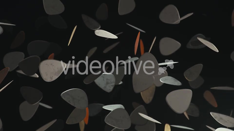 Floating Guitar Plectrums Against a Dark Background - Download Videohive 20290523