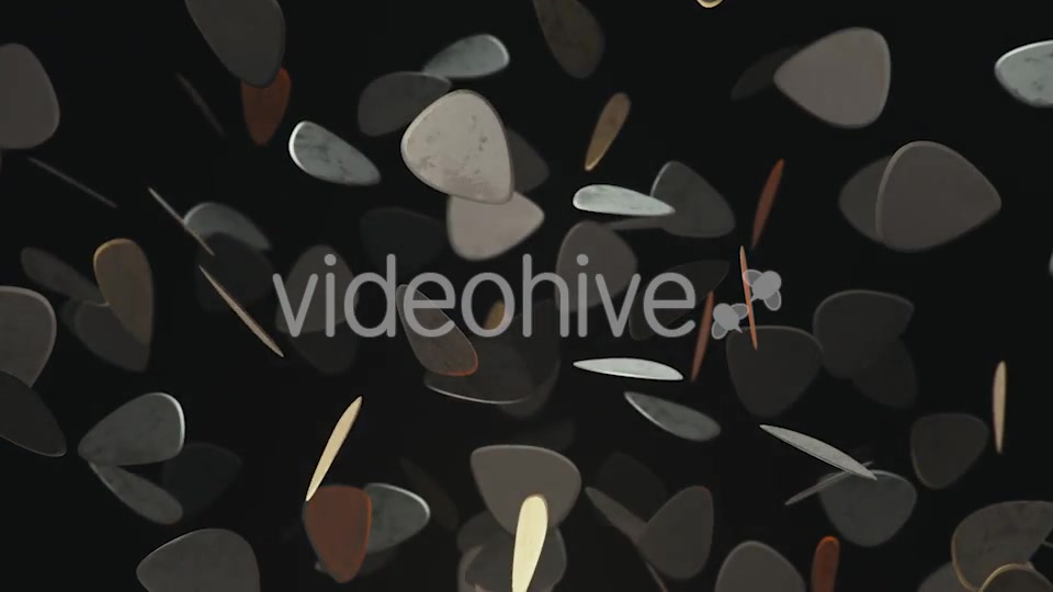 Floating Guitar Plectrums Against a Dark Background - Download Videohive 20290523