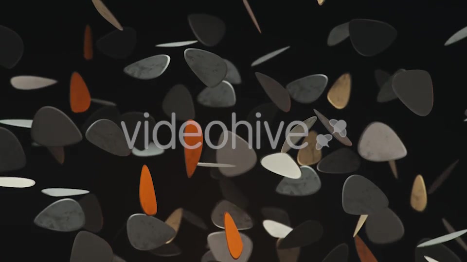 Floating Guitar Plectrums Against a Dark Background - Download Videohive 20290523