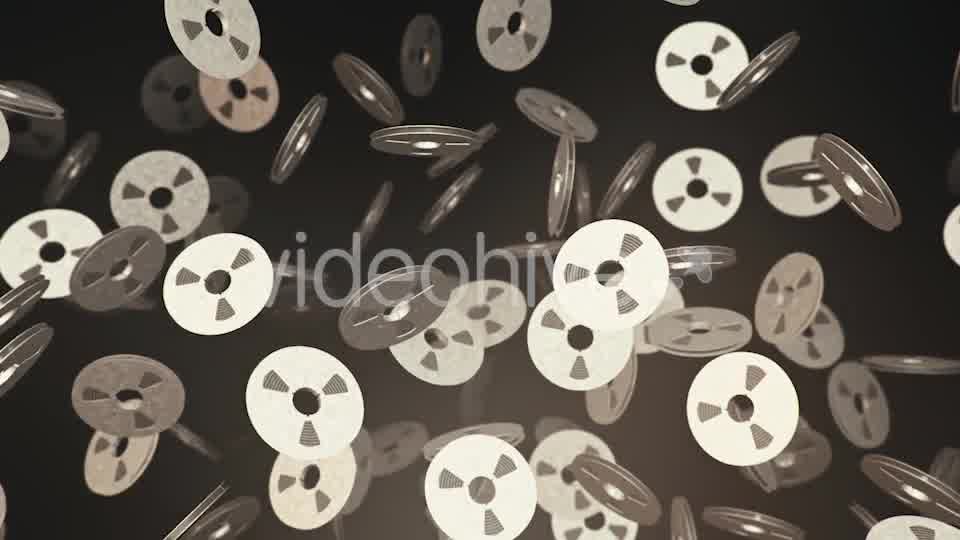 Floating Magnetic Tape Reels Against a Dark Background - Download Videohive 20290560