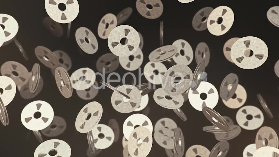 Floating Magnetic Tape Reels Against a Dark Background - Download Videohive 20290560