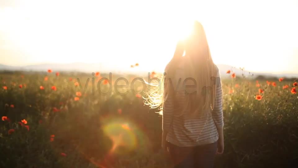 Girl Looking Ahead In The Field  Videohive 5006477 Stock Footage Image 1