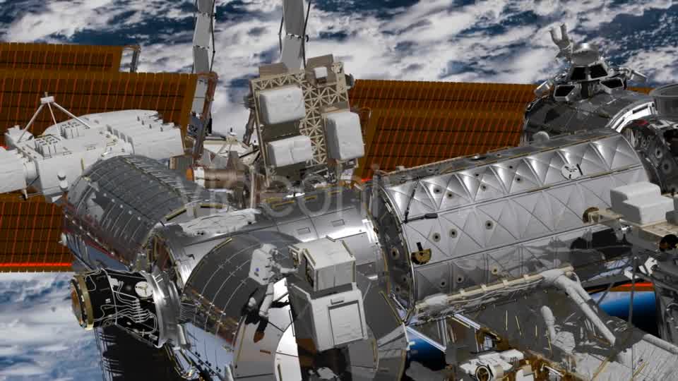 International Space Station ISS Revolving Over Earths Atmosphere. Astronaut Spacewalk. - Download Videohive 21494294