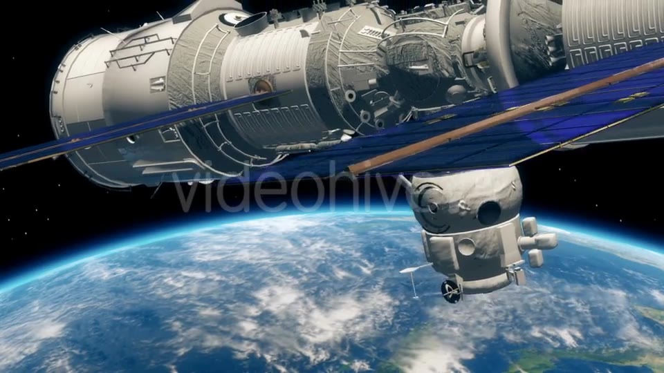 International Space Station ISS Revolving Over Earths Atmosphere - Download Videohive 21355256