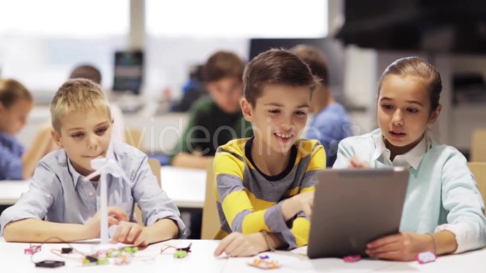 Kids with Tablet Pc Programming at Robotics School 60 - Download Videohive 19364119