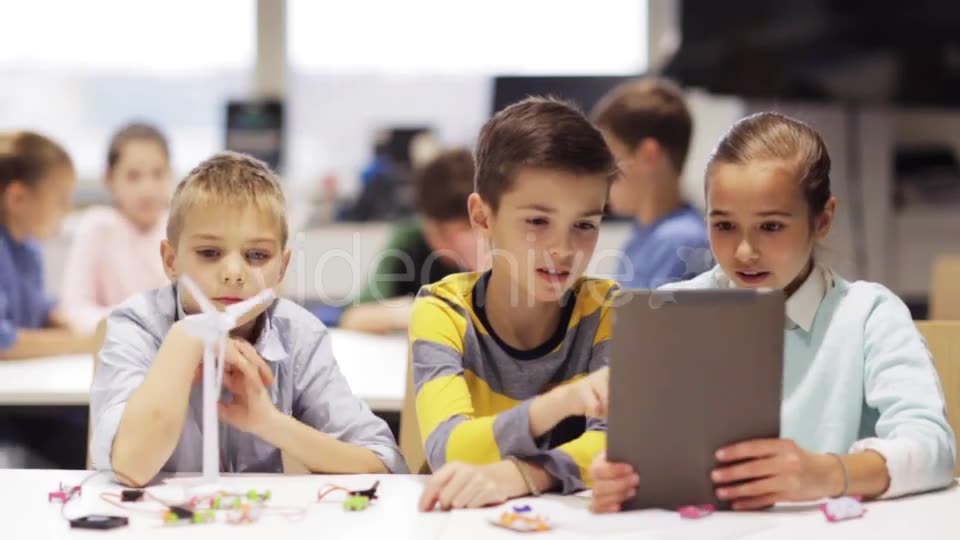 Kids with Tablet Pc Programming at Robotics School 60 - Download Videohive 19364119