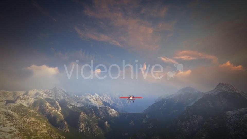 Little Red Airplane Flying Over Mountains - Download Videohive 19162994