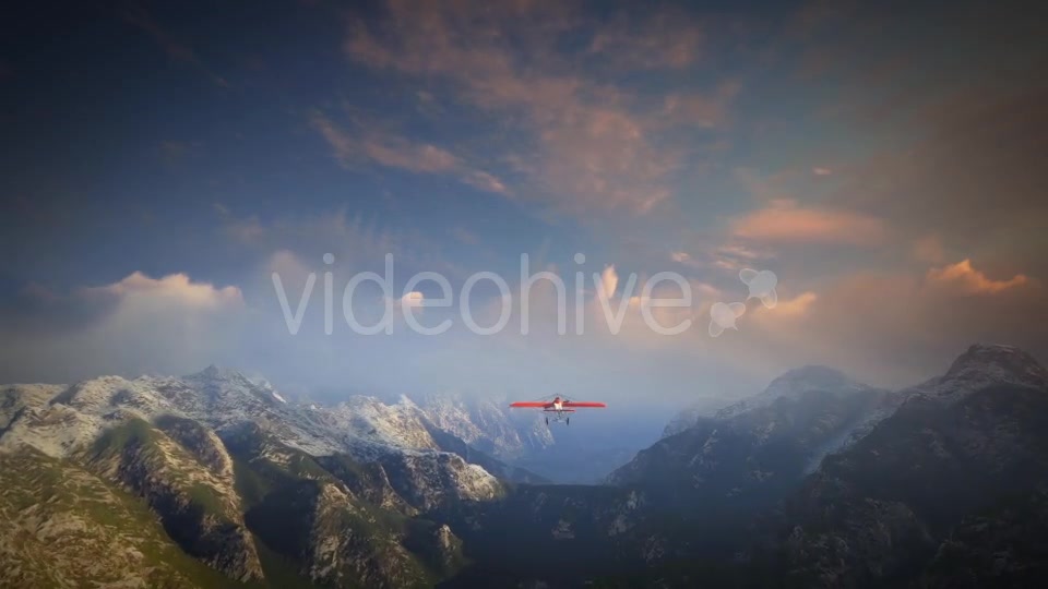 Little Red Airplane Flying Over Mountains - Download Videohive 19162994