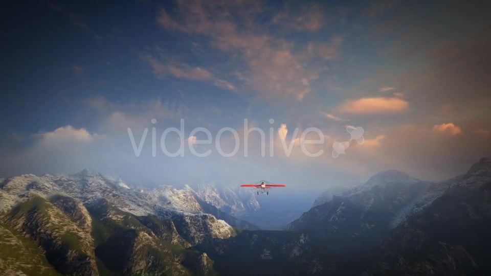 Little Red Airplane Flying Over Mountains - Download Videohive 19162994