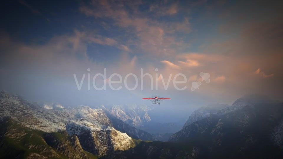 Little Red Airplane Flying Over Mountains - Download Videohive 19162994