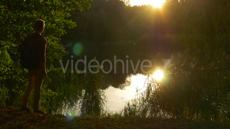 Man Comes To The Lake Sits Down On The Ground - Download Videohive 13488669