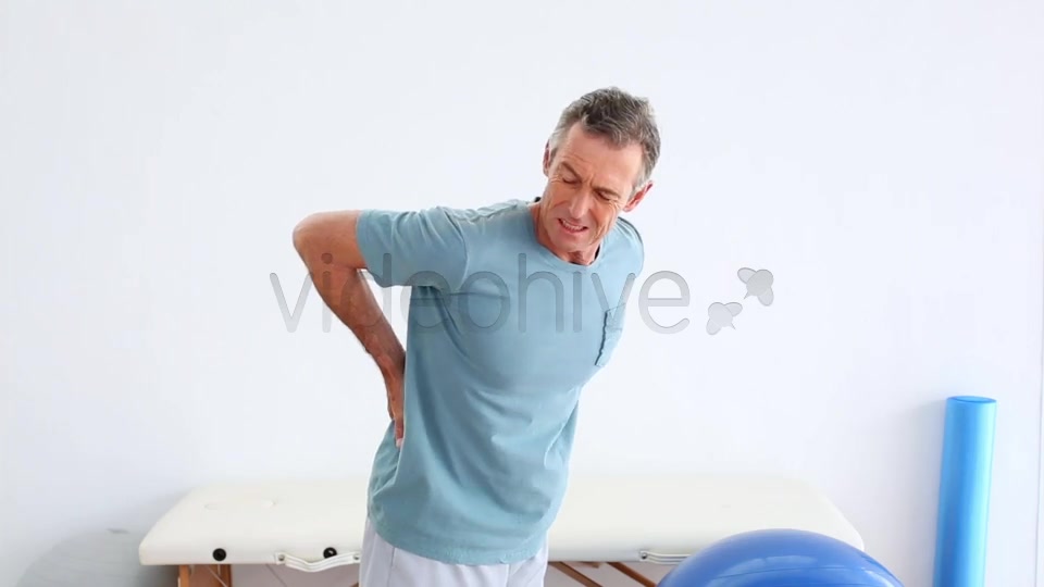 Mature Patient Rubbing His Painful Back  Videohive 8490996 Stock Footage Image 11