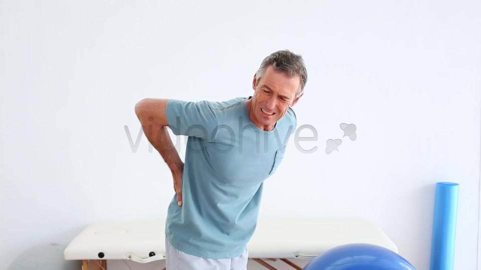 Mature Patient Rubbing His Painful Back  Videohive 8490996 Stock Footage Image 12