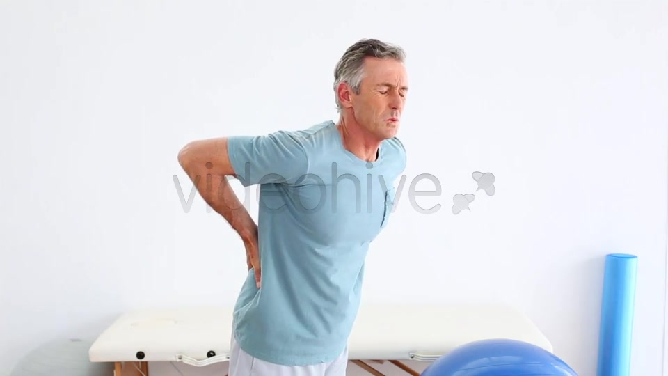 Mature Patient Rubbing His Painful Back  Videohive 8490996 Stock Footage Image 4