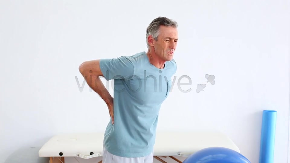 Mature Patient Rubbing His Painful Back  Videohive 8490996 Stock Footage Image 5