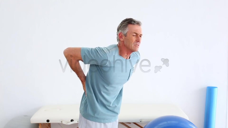 Mature Patient Rubbing His Painful Back  Videohive 8490996 Stock Footage Image 6