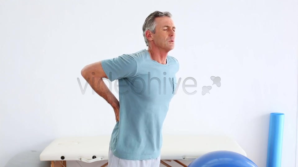 Mature Patient Rubbing His Painful Back  Videohive 8490996 Stock Footage Image 7