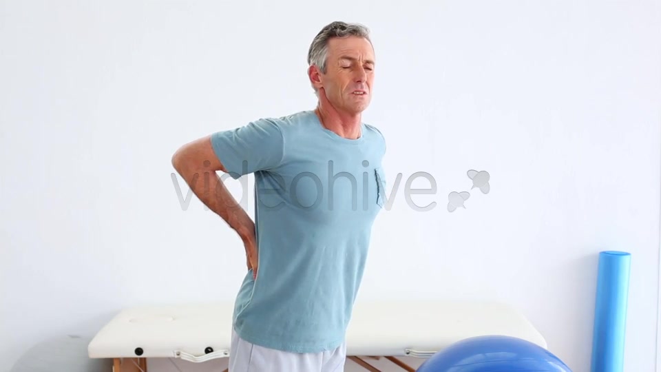 Mature Patient Rubbing His Painful Back  Videohive 8490996 Stock Footage Image 9