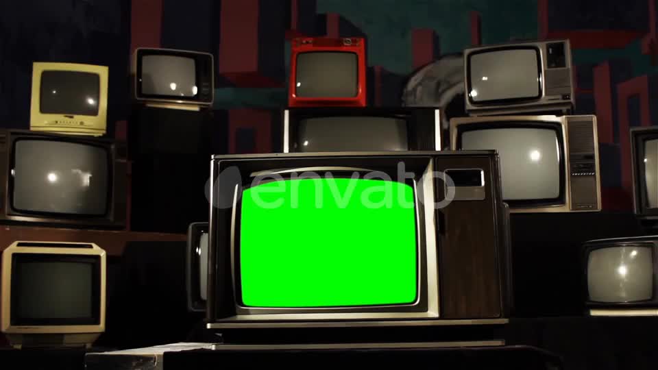 Old TV Green Screen in the Middle of Many TVs. Aesthetics of the 80s.  Videohive 21360677 Stock Footage Image 1