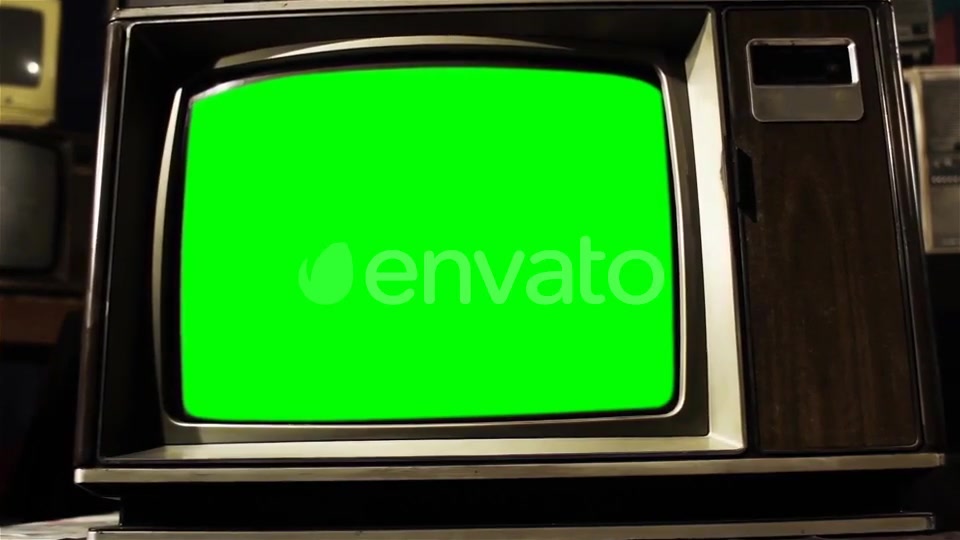 Old TV Green Screen in the Middle of Many TVs. Aesthetics of the 80s.  Videohive 21360677 Stock Footage Image 8