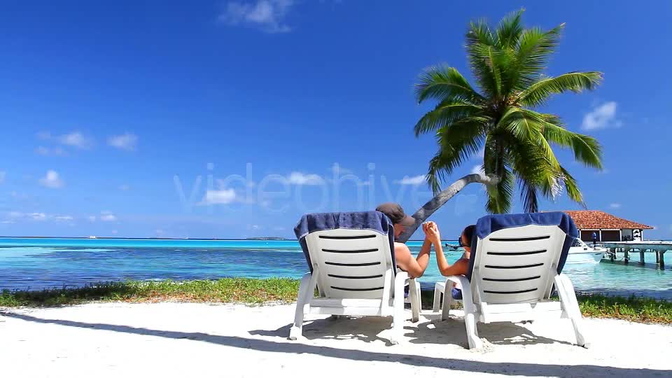 Romantic Couple Resting on Deckchairs - Download Videohive 4384945