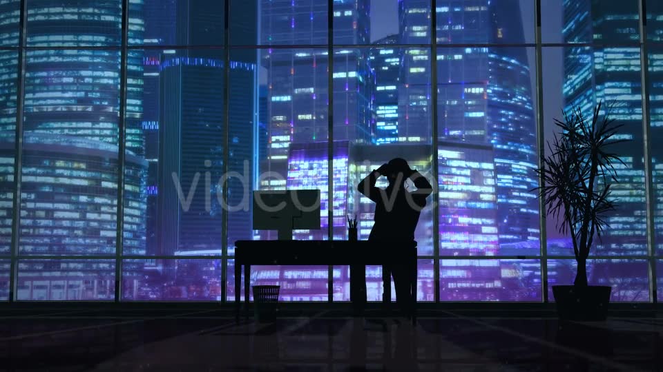 Silhouette Of A Man Working Late In The Office - Download Videohive 20833218