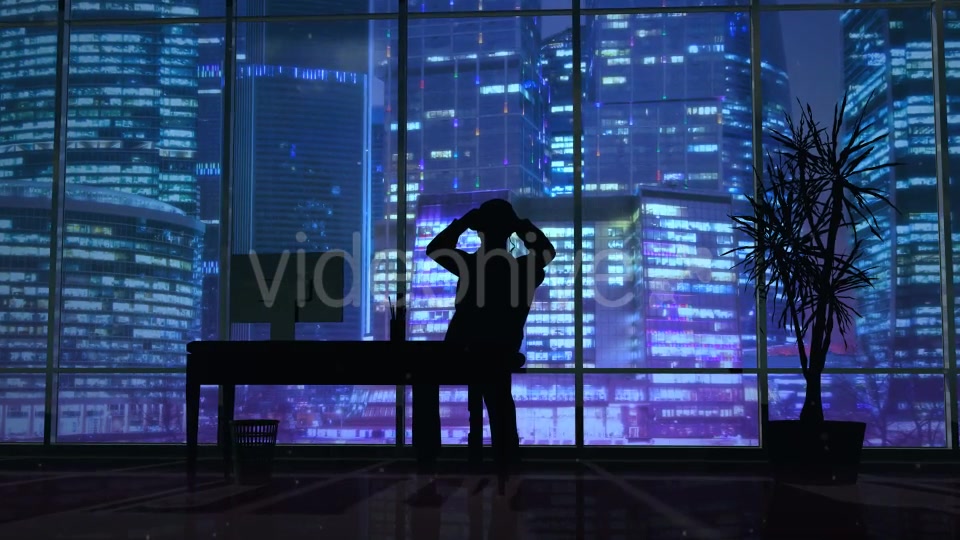 Silhouette Of A Man Working Late In The Office - Download Videohive 20833218