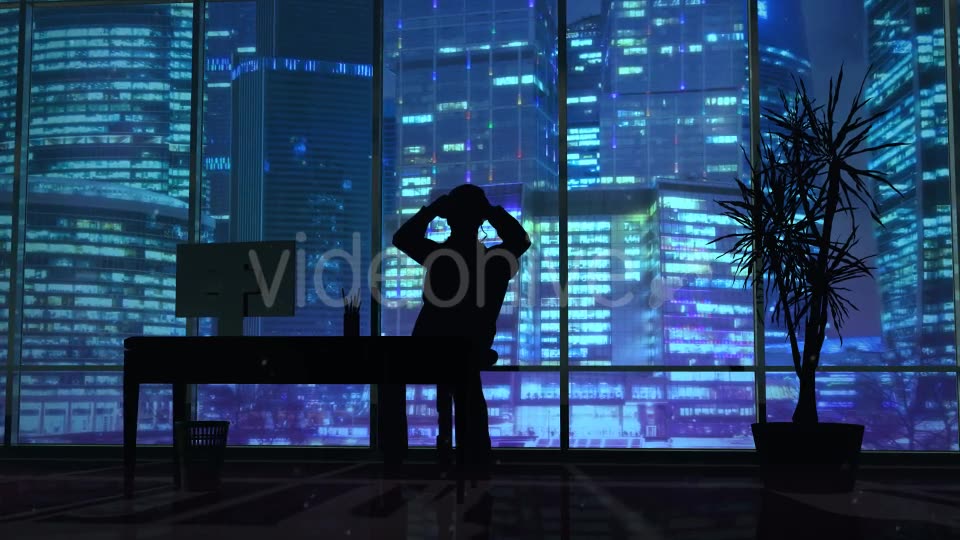 Silhouette Of A Man Working Late In The Office - Download Videohive 20833218