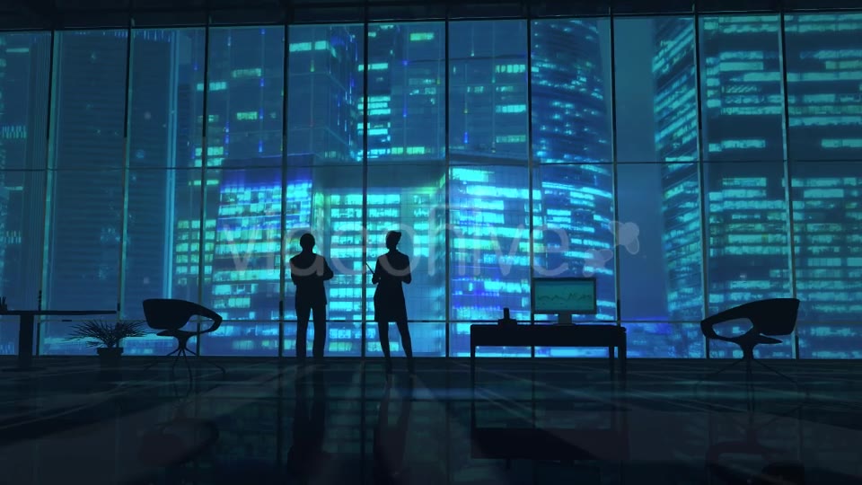 Silhouettes In An Office Building Against Of Skyscrapers - Download Videohive 20524474