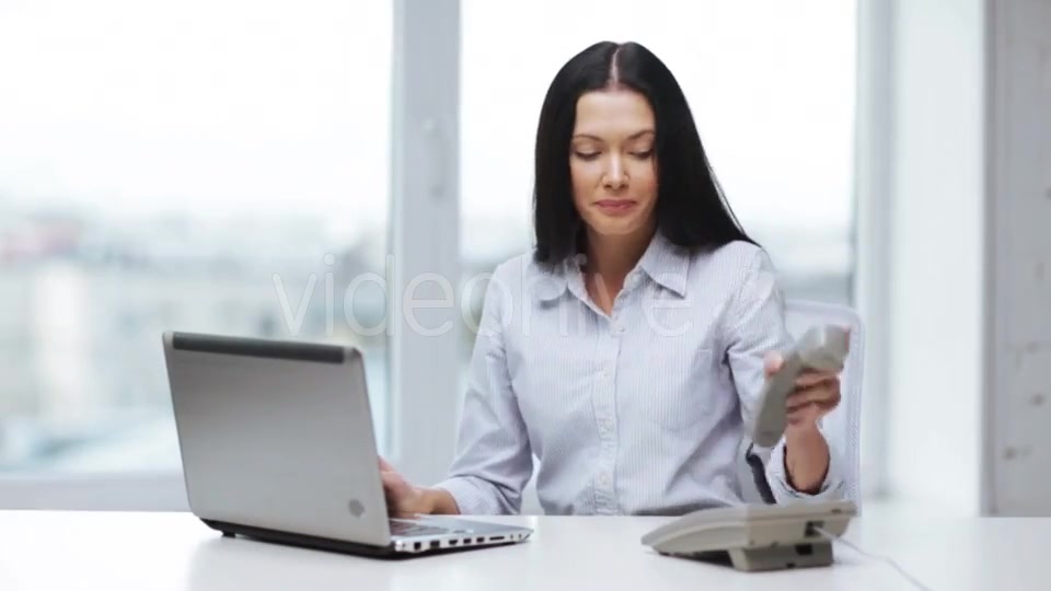 Smiling Businesswoman With Laptop Calling On Phone  - Download Videohive 11465240