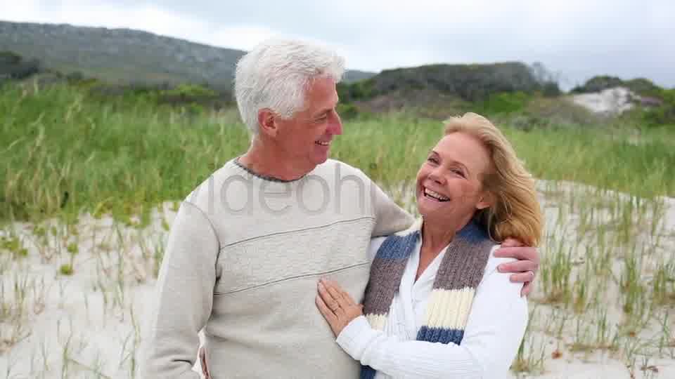 Smiling Retired Couple Standing On The Beach  Videohive 8435982 Stock Footage Image 10