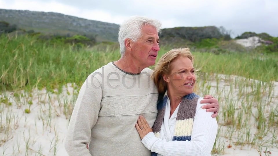 Smiling Retired Couple Standing On The Beach  Videohive 8435982 Stock Footage Image 3
