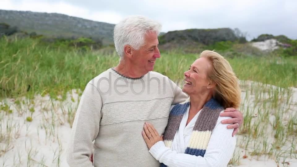 Smiling Retired Couple Standing On The Beach  Videohive 8435982 Stock Footage Image 7