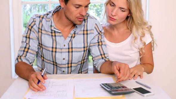 Stressed Young Paying Their Bills Together  - 8505792 Download Videohive