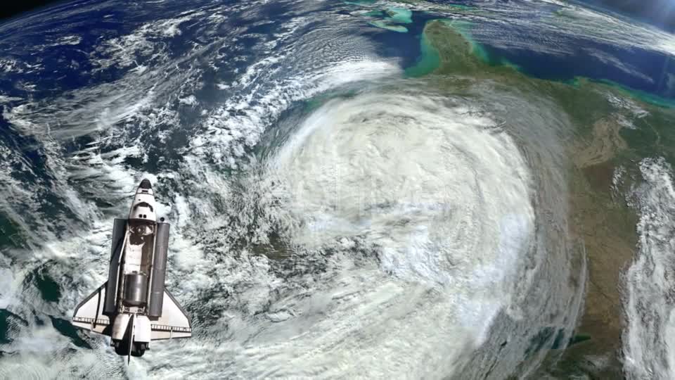 The Space Shuttle Above the Earth and a Hurricane - Download Videohive 21359552