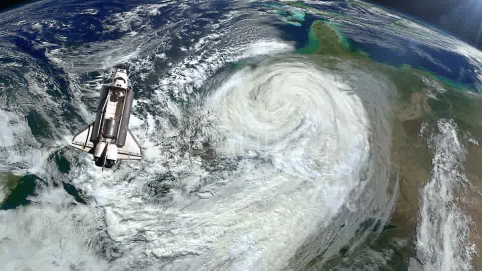 The Space Shuttle Above the Earth and a Hurricane - Download Videohive 21359552