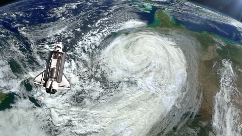 The Space Shuttle Above the Earth and a Hurricane - Download Videohive 21359552