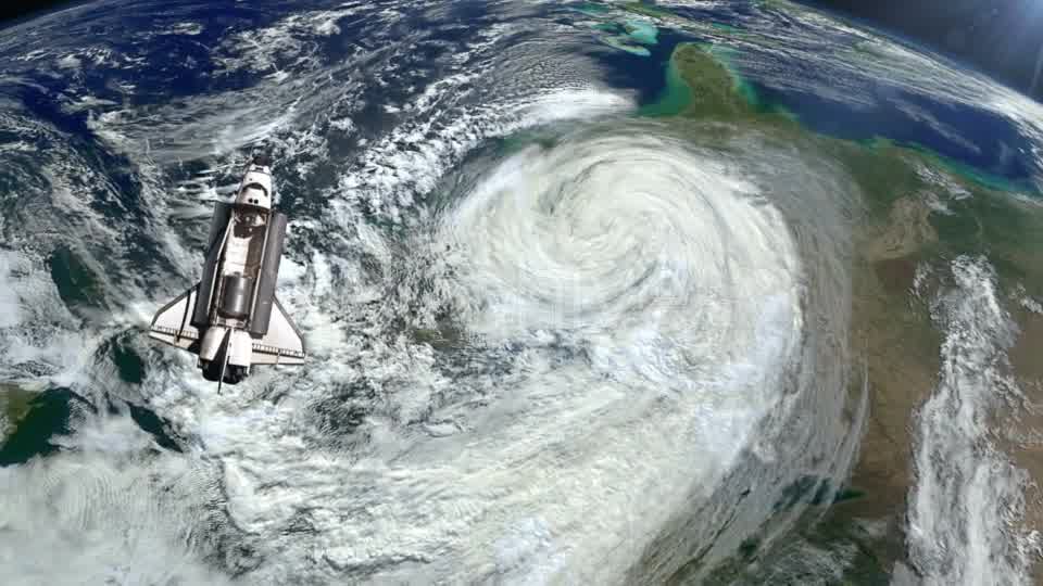 The Space Shuttle Above the Earth and a Hurricane - Download Videohive 21359552