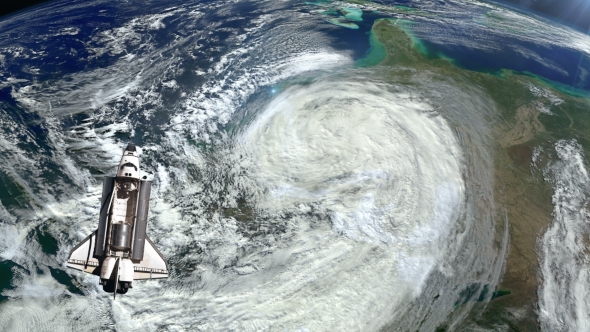 The Space Shuttle Above the Earth and a Hurricane - Download Videohive 21359552