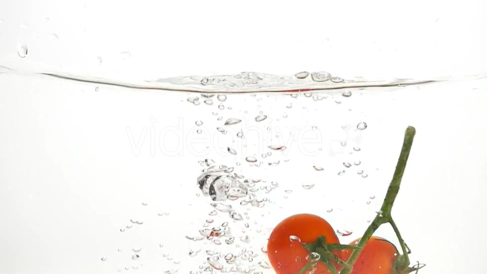 Whole Tomatoes Falling Through Water. - Download Videohive 19450525