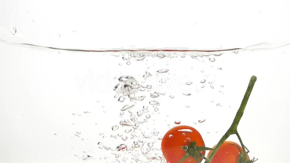 Whole Tomatoes Falling Through Water. - Download Videohive 19450525