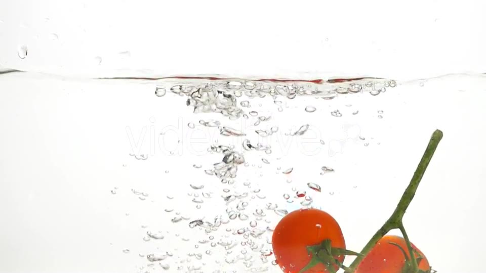 Whole Tomatoes Falling Through Water. - Download Videohive 19450525