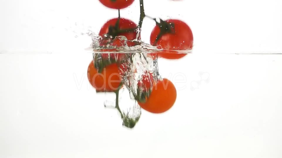 Whole Tomatoes Falling Through Water. - Download Videohive 19450525