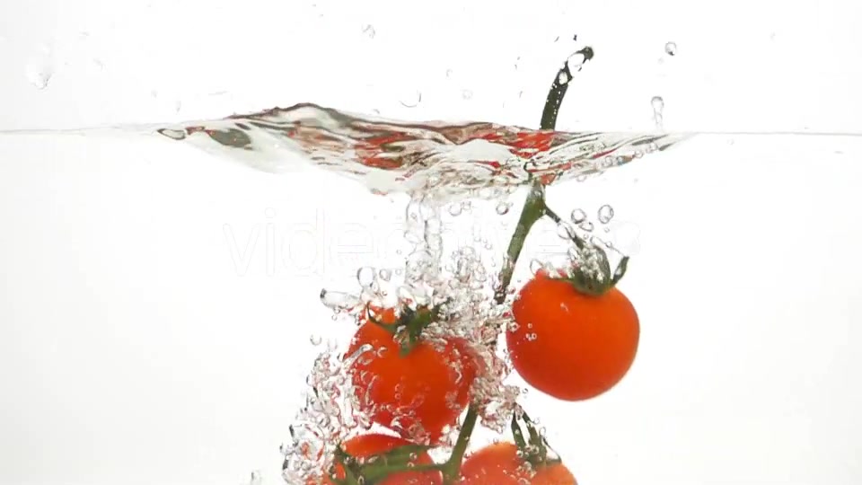 Whole Tomatoes Falling Through Water. - Download Videohive 19450525